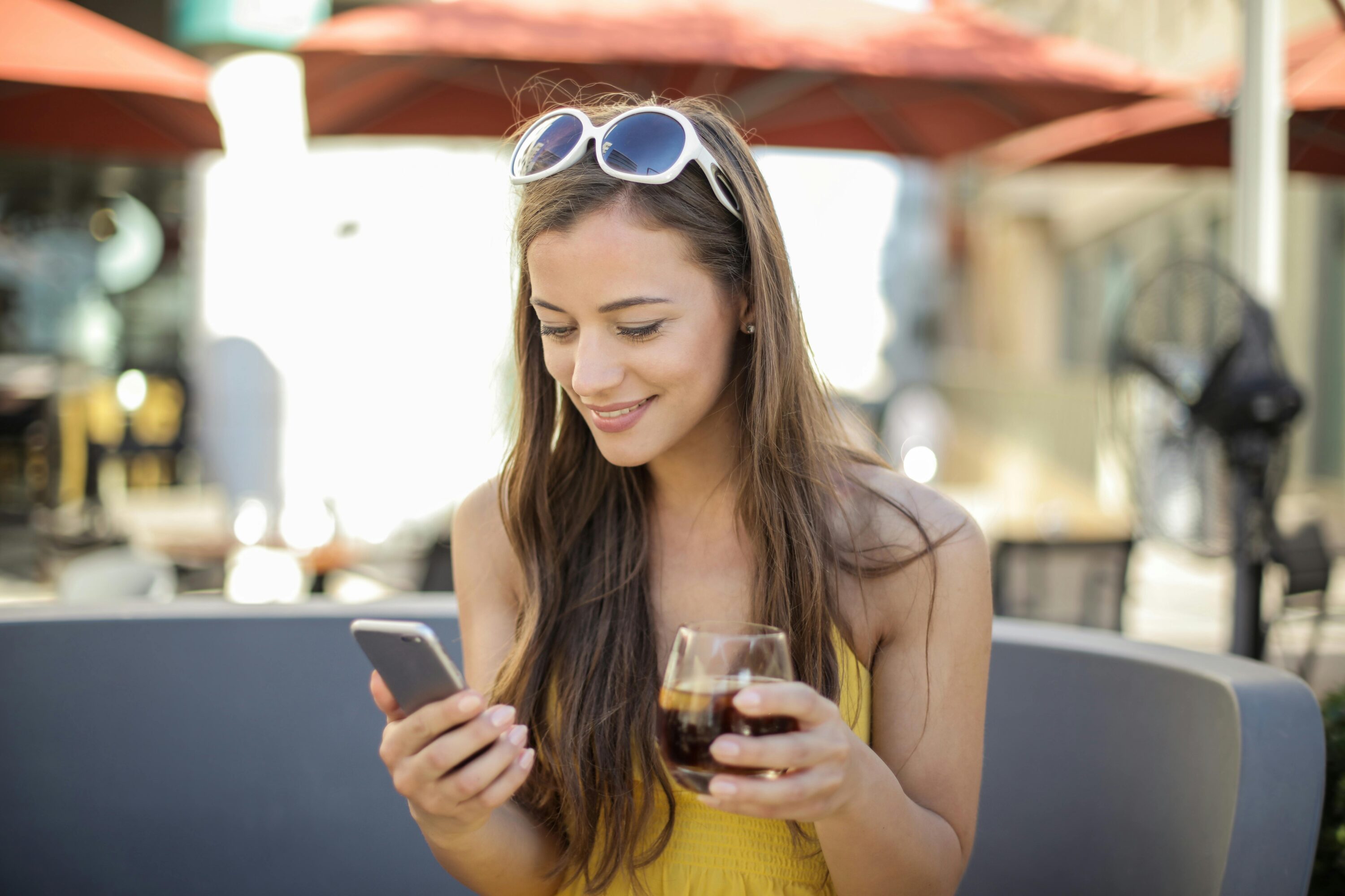 Someone smiling at their phone.