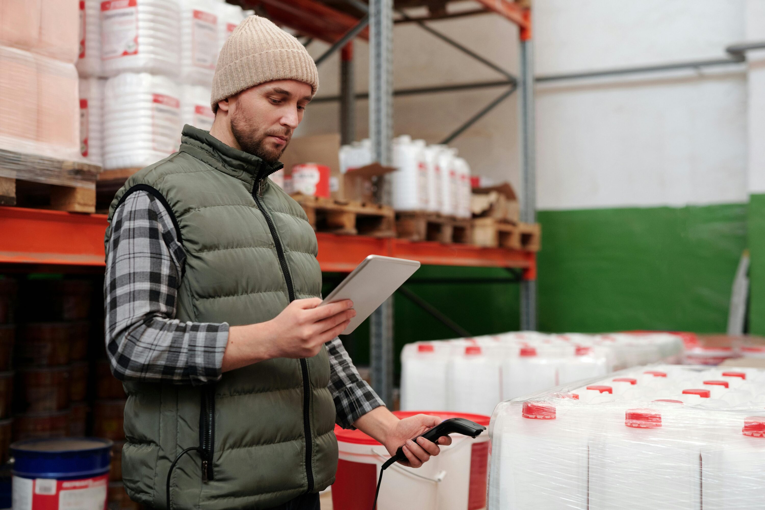 Someone counting stock in a warehouse for eCommerce fulfillment.